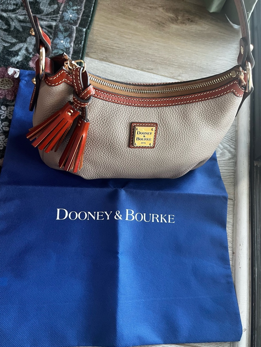 Dooney & Bourke Pebble Leather Shoulder Bag in Beige with Brown Trim and Tassels